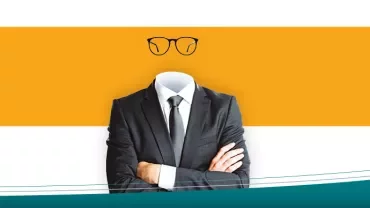 Person in suit with arms crossed and a missing head, glasses above.