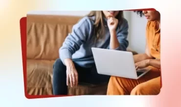Promotional tile from Talent Trends 2026 featuring two women pointing at a computer screen